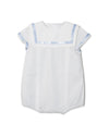 Carriage Boutique white baby bubble romper with a sailor-style collar and light blue trim details.