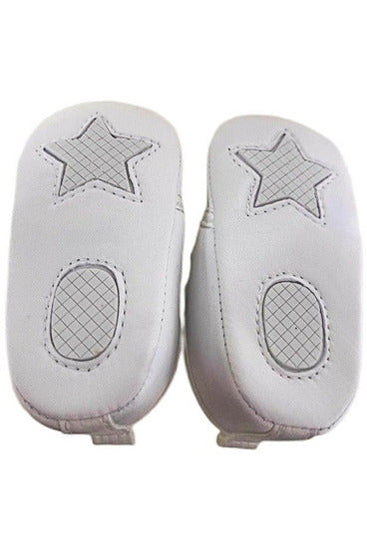 Carriage Boutique white baby christening shoes with star and oval grip patterns on the soft soles