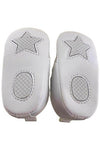 Carriage Boutique white baby christening shoes with star and oval grip patterns on the soft soles