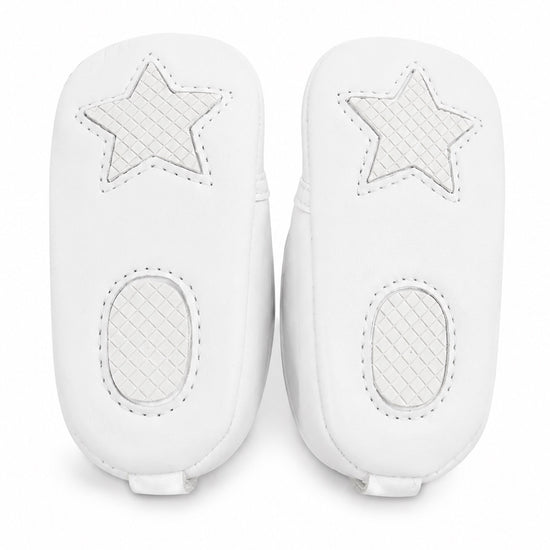 Carriage Boutique white baby christening shoes featuring star-patterned non-slip soles for infants