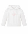 Carriage Boutique white cotton cable knit baby sweater with a hood and custom pink monogram embroidery on the chest.