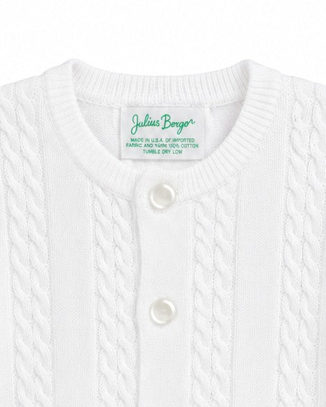 Carriage Boutique white cable-knit cotton baby boy cardigan with button-front closure and crew neckline.