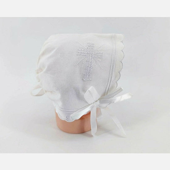 Carriage Boutique white cotton baby bonnet with embroidered cross and scalloped edge, satin ribbon tie.
