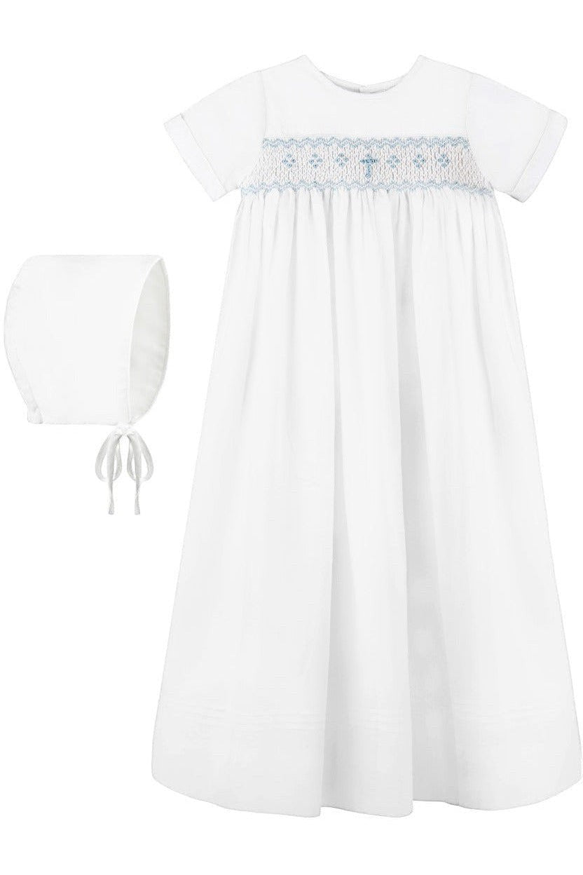 Carriage Boutique white baby boy christening gown with hand-smocked yoke, baby blue bullion cross, and matching bonnet