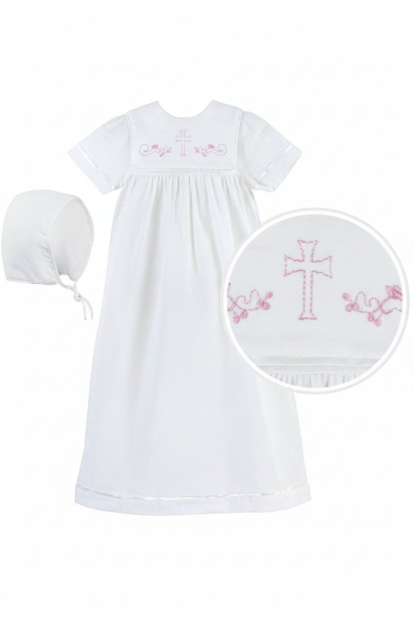 Carriage Boutique white baby christening gown with matching bonnet featuring delicate pink cross embroidery