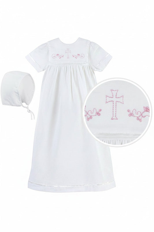 Carriage Boutique white baby christening gown with matching bonnet featuring delicate pink cross embroidery