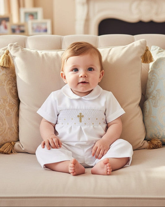 Carriage Boutique baby boy white tetalin cotton christening longall with hand-smocked gold cross and matching bonnet.