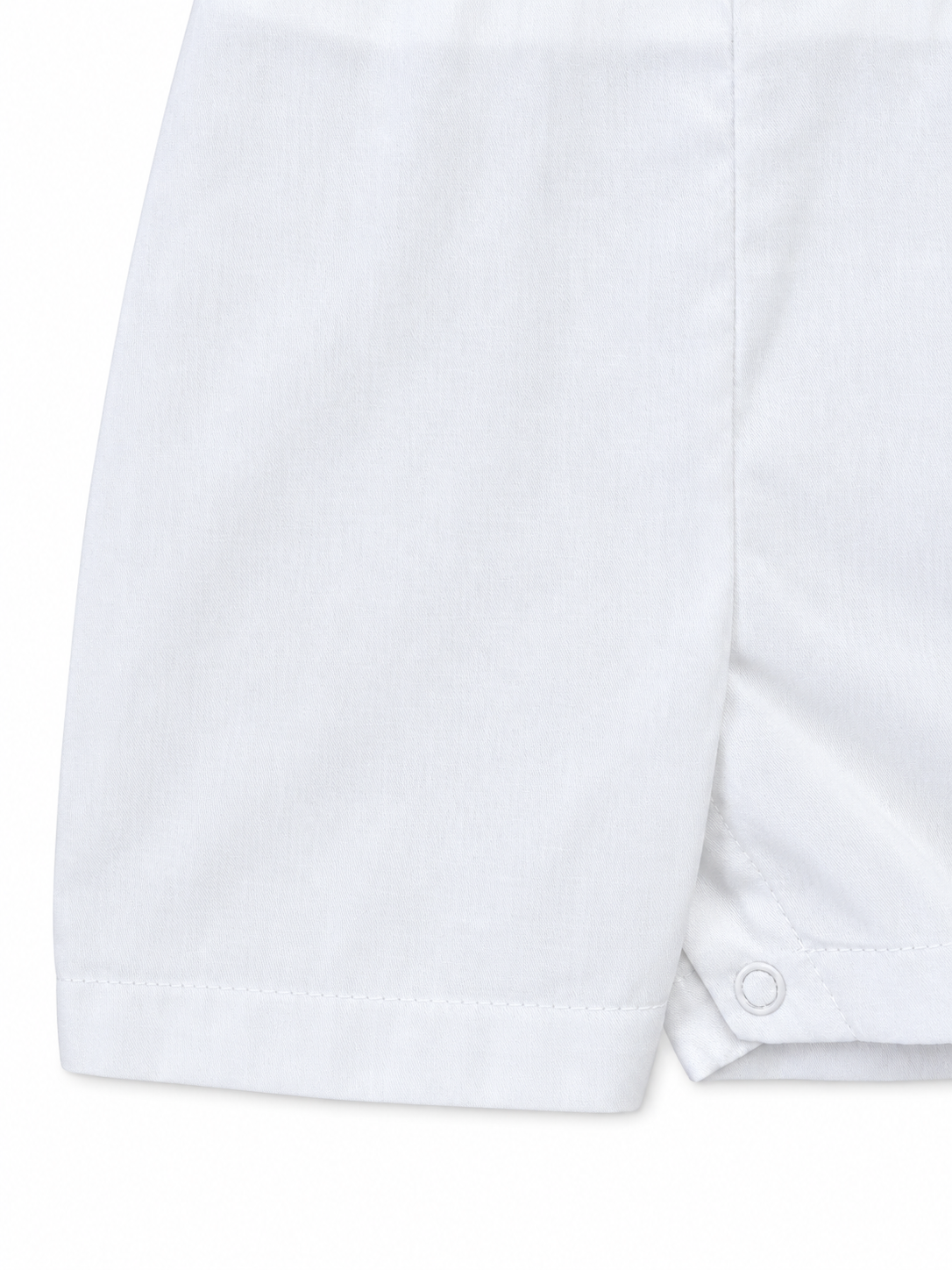 Carriage Boutique white cotton bobby suit shorts with a secure snap button closure for baby boys