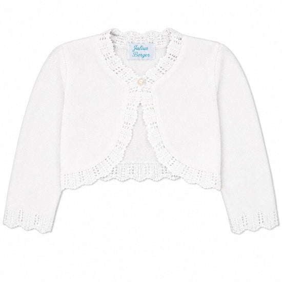 Carriage Boutique white cotton bolero shrug for baby girls with textured knit pattern and single button closure.