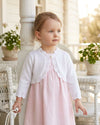 Carriage Boutique white cotton toddler bolero shrug with textured knit pattern and single button closure