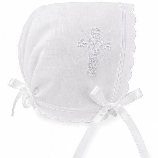 Carriage Boutique white cotton baby christening bonnet with delicate embroidered cross and scalloped edge detail.