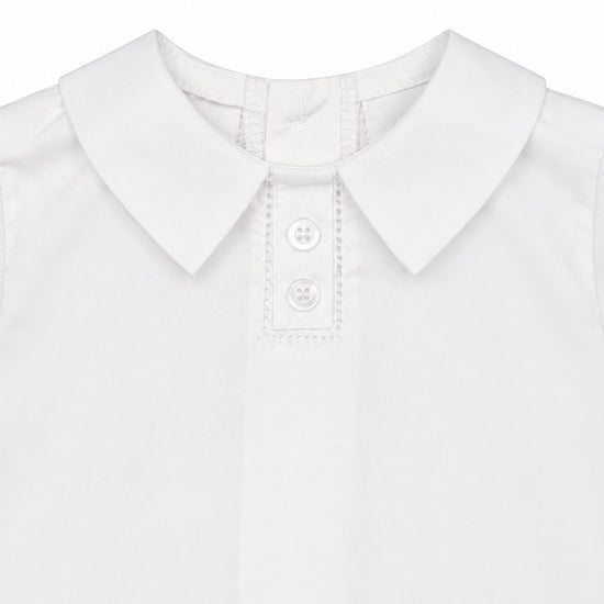 Carriage Boutique white cotton christening shirt with a classic collar and delicate hand embroidery detail