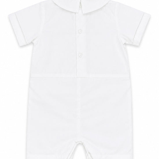 Carriage Boutique white cotton baby boy christening shortall with Peter Pan collar and hand embroidery detail.