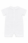 Carriage Boutique white cotton baby boy christening shortall with Peter Pan collar and hand embroidery detail.