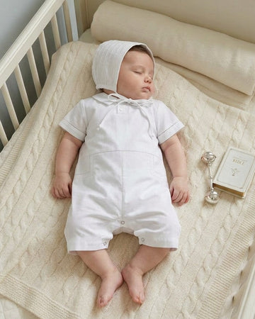 Carriage Boutique white cotton baby boy christening shortall outfit with hand embroidery and matching bonnet