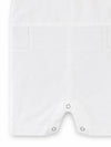 Carriage Boutique white cotton baby boy christening shortall with hand embroidery detail and crotch snaps.