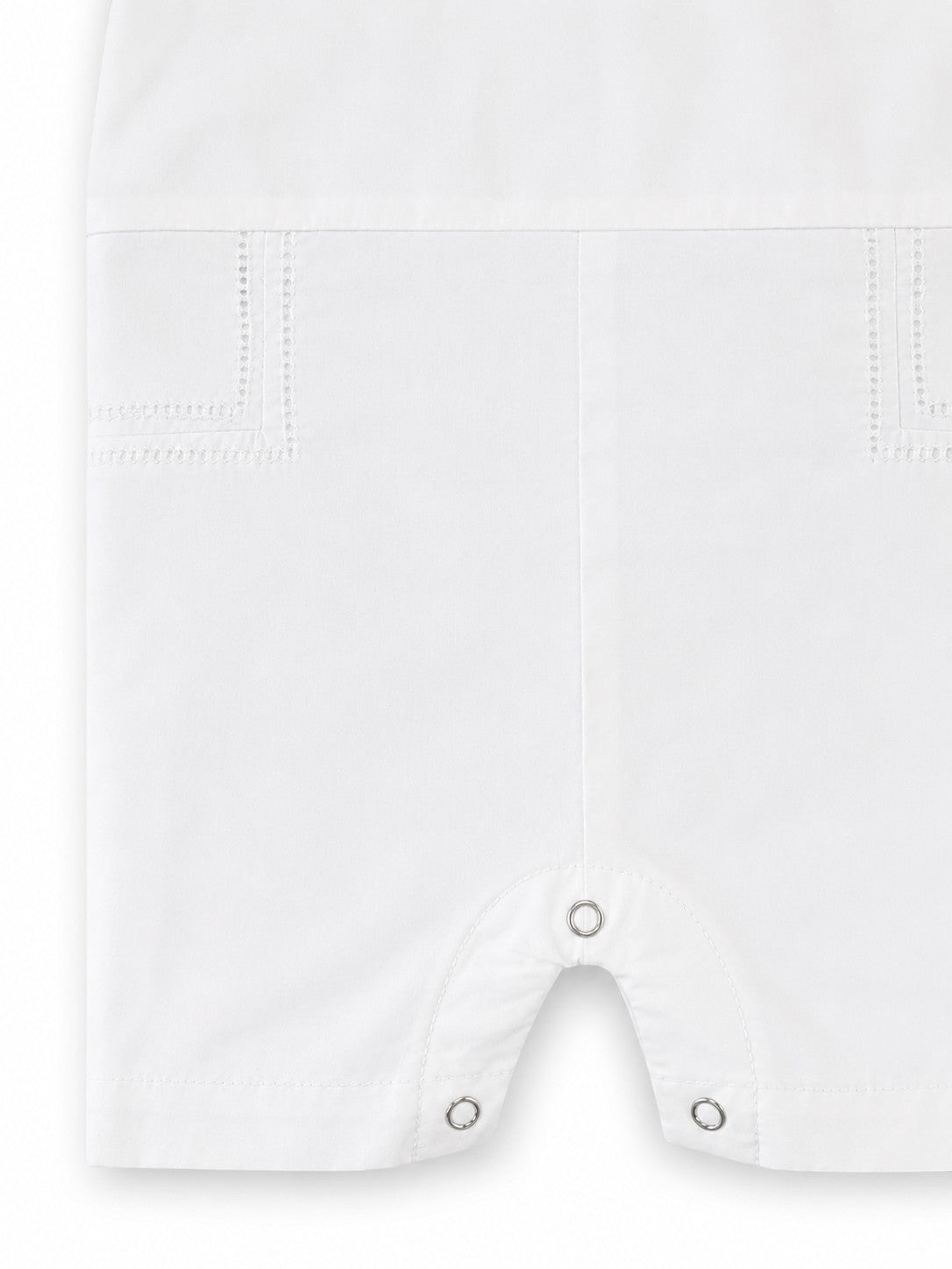 Carriage Boutique white cotton baby boy christening shortall with hand embroidery detail and crotch snaps.