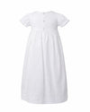 Carriage Boutique white cotton girls gown with puff sleeves and button back closure, back view