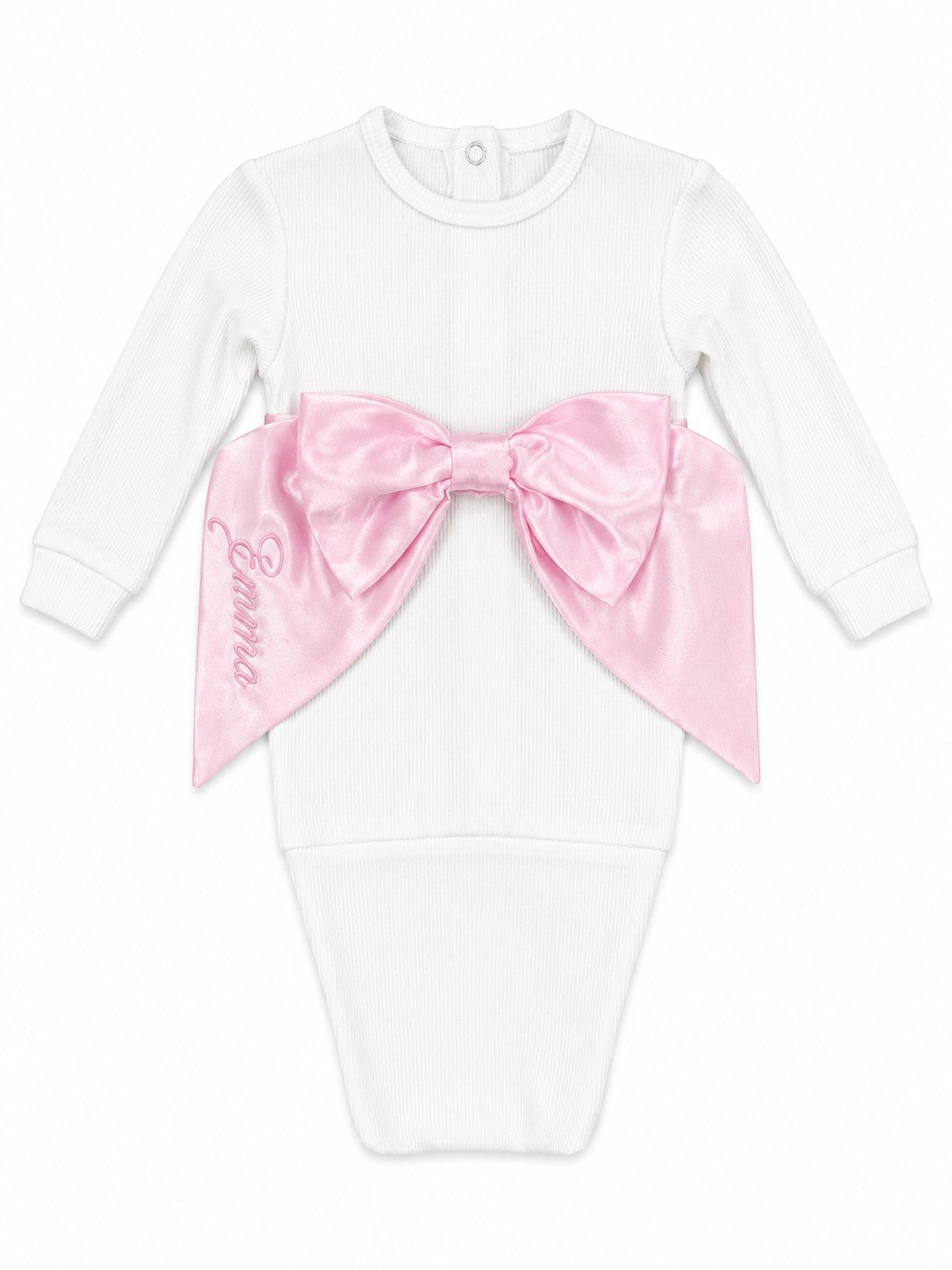 Carriage Boutique newborn white ribbed cotton swaddle bag featuring a large pink satin bow and personalized embroidery