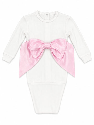 Carriage Boutique newborn white cotton swaddle bag featuring a large satin pink bow on the front