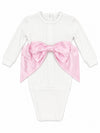 Carriage Boutique white cotton newborn swaddle bag featuring a large pink satin bow and personalized embroidery