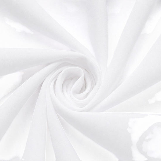 Carriage Boutique white fabric swirl showing the soft texture of the christening gown material