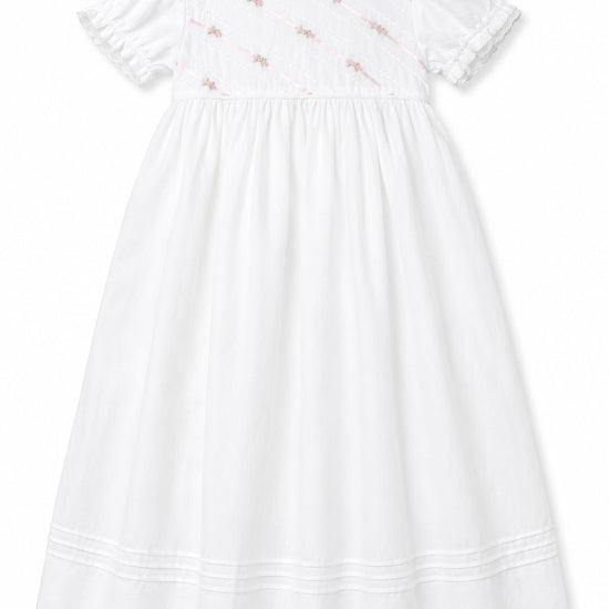 Carriage Boutique white girls gown with pink ribbon and floral embroidery, featuring puff sleeves and matching bonnet.