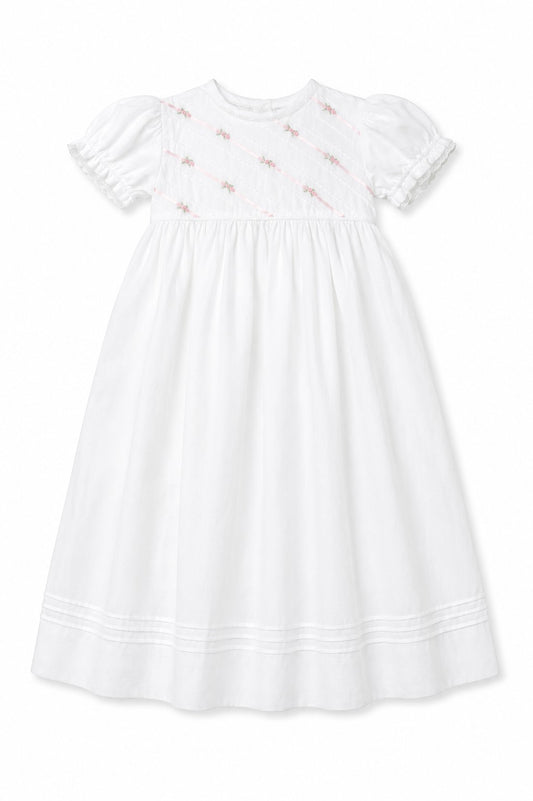 Carriage Boutique white girls gown with pink ribbon and floral embroidery, featuring puff sleeves and matching bonnet.