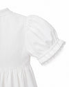 Carriage Boutique white girls gown sleeve detail with delicate lace trim and gathered puff shoulder
