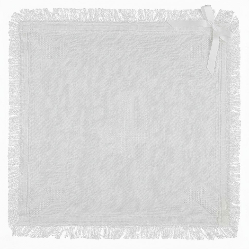 Carriage Boutique white knit baby blanket with fringe trim and a delicate satin ribbon bow corner accent