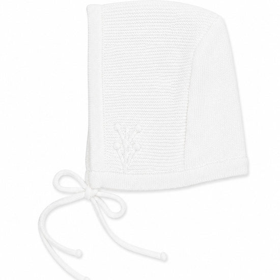 Carriage Boutique white knit baby bonnet with delicate leaf embroidery and tie closure for christening or bris