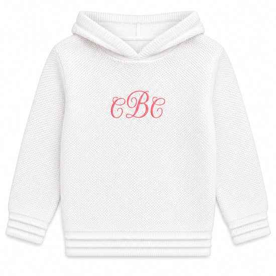 Carriage Boutique white knit baby hoodie with a hood and personalized red monogram embroidery on the chest
