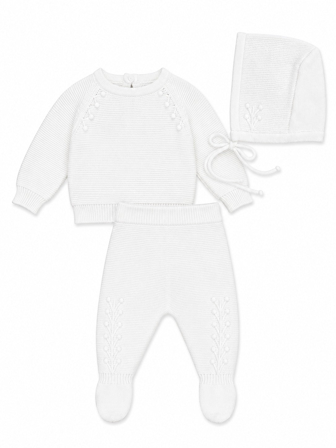 Carriage Boutique white knit baby boy christening outfit with leaf embroidery, long-sleeve top, pants, and bonnet.
