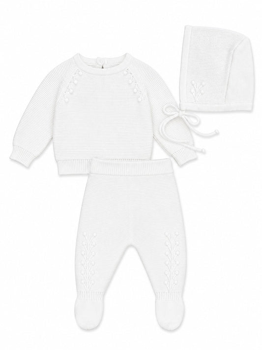 Carriage Boutique white knit baby boy christening outfit with leaf embroidery, long-sleeve top, pants, and bonnet.