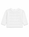 Carriage Boutique white knit baby sweater with textured dot pattern and long sleeves for a special occasion