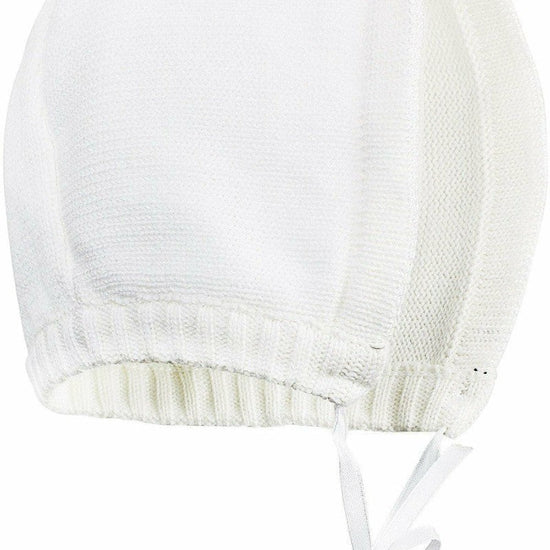 Carriage Boutique white knit baby baptism bonnet with ribbed trim and tie closure