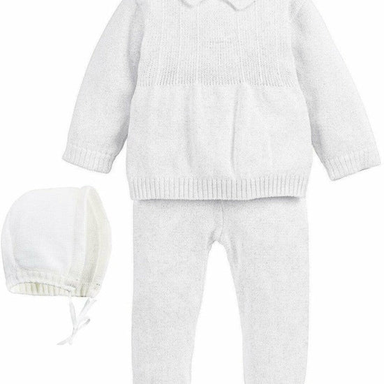 Carriage Boutique white knit baby boy baptism outfit with a collared sweater, matching trousers, and a bonnet.