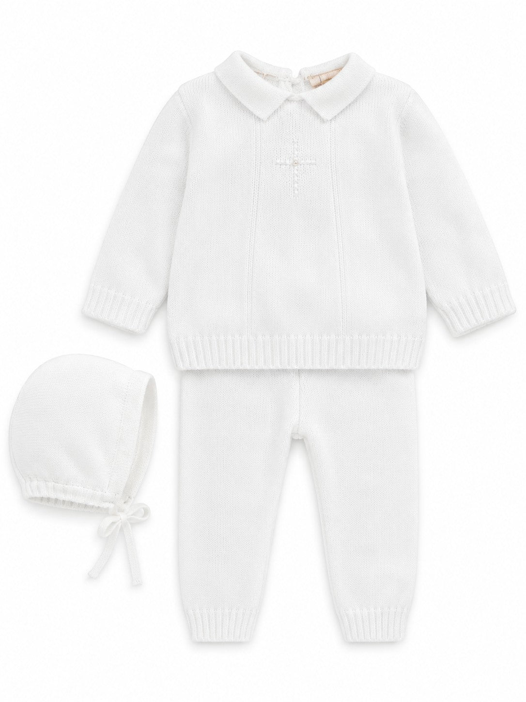 Carriage Boutique white knit baptism outfit for baby boys featuring a pearl cross, collared top, pants, and bonnet.