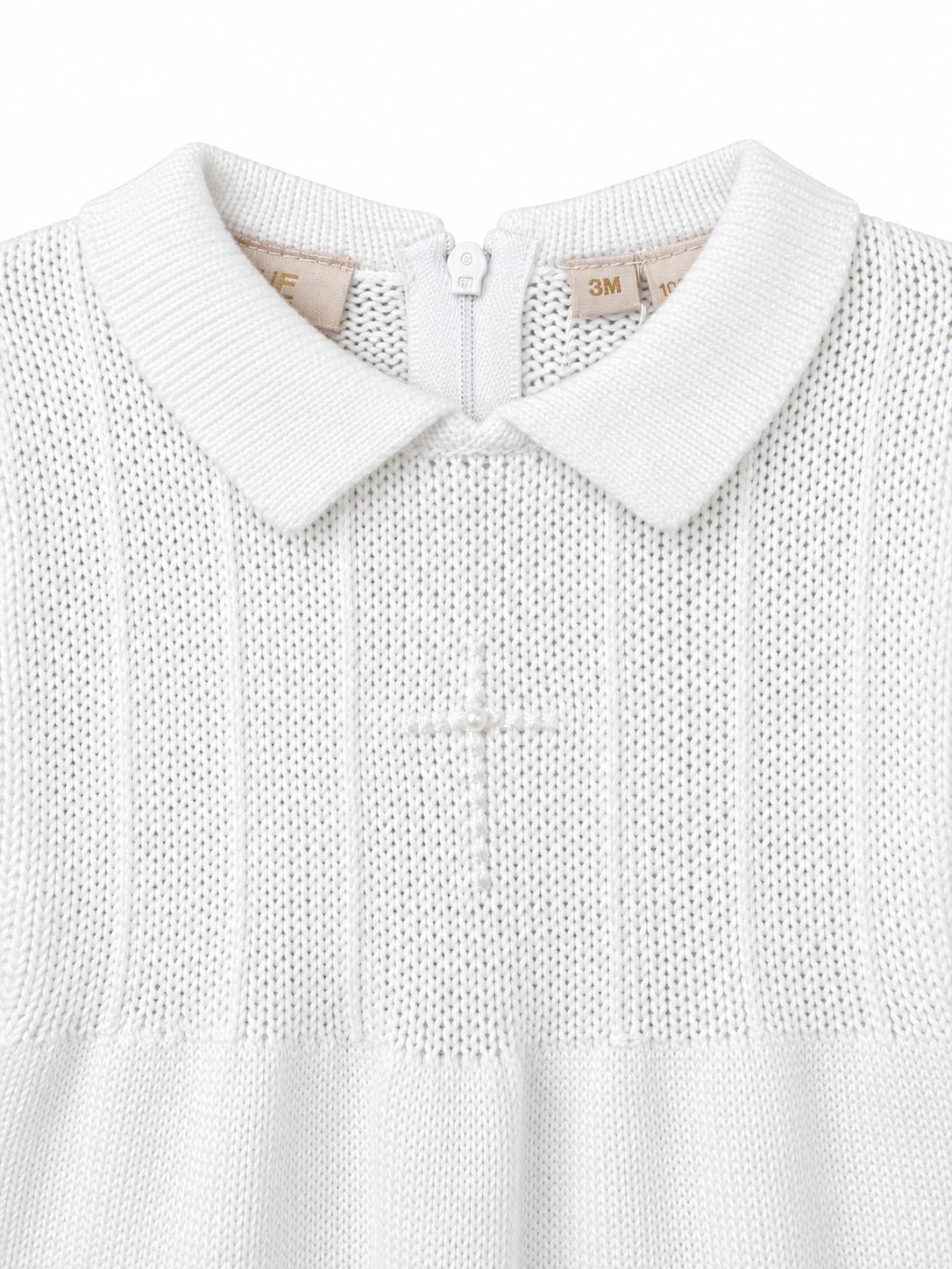 Carriage Boutique white knit cotton christening outfit featuring a collared neckline and embroidered cross with pearl
