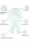 Carriage Boutique white knit cotton christening romper with embroidered cross, pearl detail, and ribbed trim.