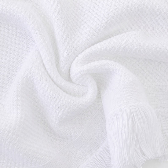 Carriage Boutique white knit baby blanket with soft texture and delicate fringe detail, perfect for monogramming.