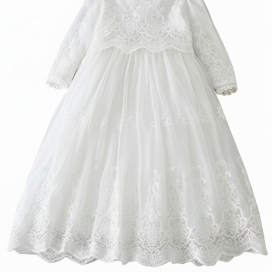 Carriage Boutique white long sleeve christening gown featuring intricate lace embroidery and a scalloped hem.