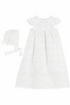 Carriage Boutique white lace christening gown with matching bonnet for baby girls, featuring intricate floral patterns.