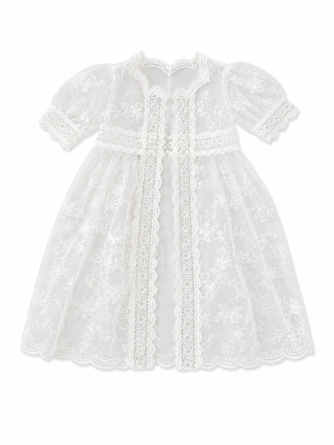 Carriage Boutique white lace christening gown with delicate embroidery, scalloped edges, and short puffed sleeves.