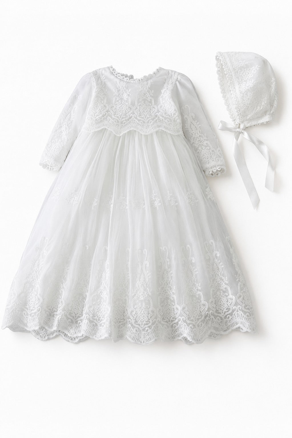 Carriage Boutique white long sleeve christening gown with intricate lace embroidery and matching scalloped bonnet