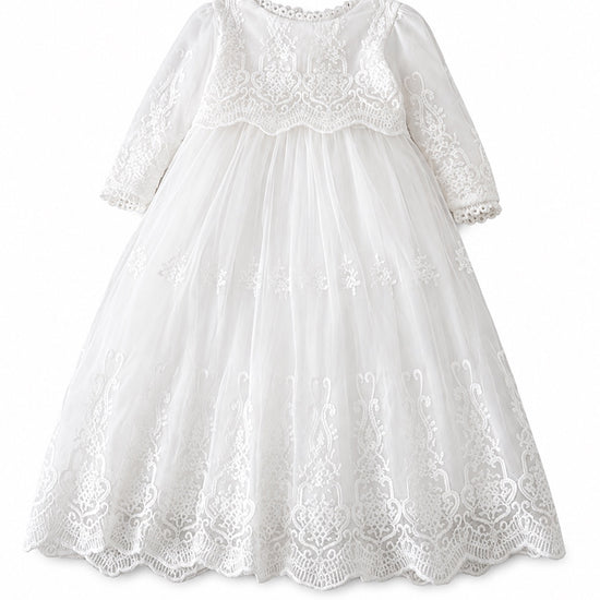 Carriage Boutique white long sleeve christening gown with intricate lace embroidery and a scalloped hem