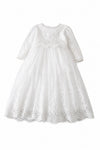 Carriage Boutique white long sleeve christening gown with intricate lace embroidery and a scalloped hem