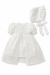 Carriage Boutique white lace christening gown with puffed sleeves and matching bonnet for baby girls