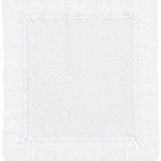 Carriage Boutique white christening blanket shawl featuring delicate Belgium lace and elegant ribbon corner accents.
