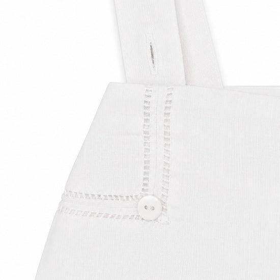 Carriage Boutique white linen cotton blend christening shorts with suspenders and hand embroidered button detail